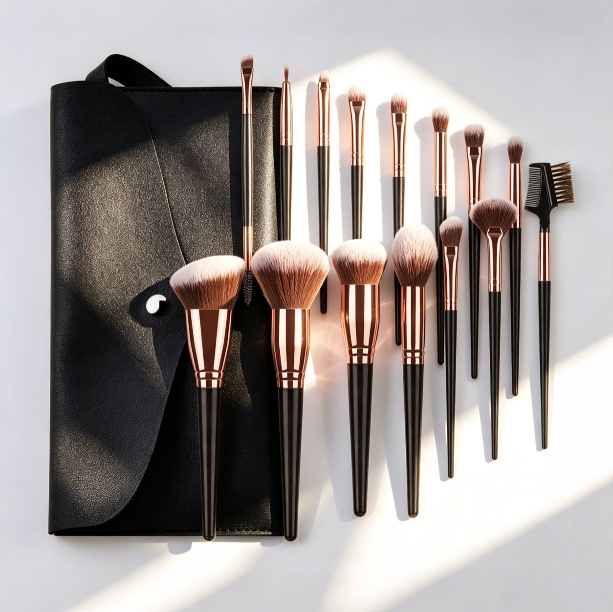 Black and rose-gold makeup brush collection